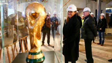 Brazilian soccer player Marta looks at a copy of the FIFA World Cup trophy during her visit to the construction site of the FIFA World Football Museum in Zurich Reuters 