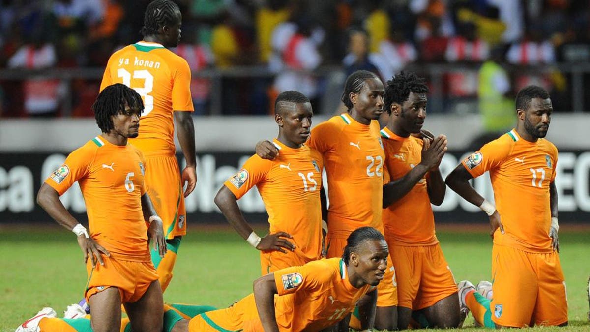 Herve Renard, coach of Ivory Coast, comforts the devastate…