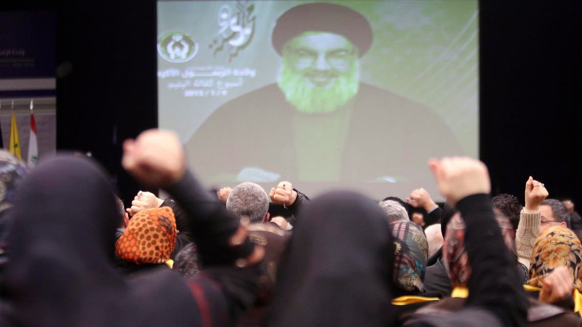 Lebanon's Hezbollah leader Sayyed Hassan Nasrallah addresses his supporters via a screen during a ceremony celebrating the birthday anniversary of Prophet Mohammed in Beirut's southern suburbs, Jan. 9, 2015. (Reuters)