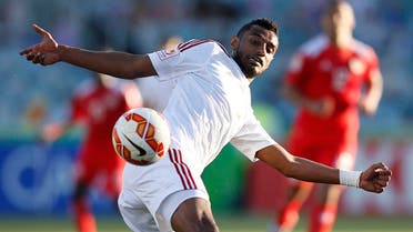 UAE's Mohamed Ahmad Gharib attempts to clear the ball during their Asian Cup Group C soccer match against Bahrain at the Canberra stadium in Canberra Jan. 15, 2015.  (Reuters)