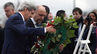 Kerry lays wreath at kosher market hit by militant attack 