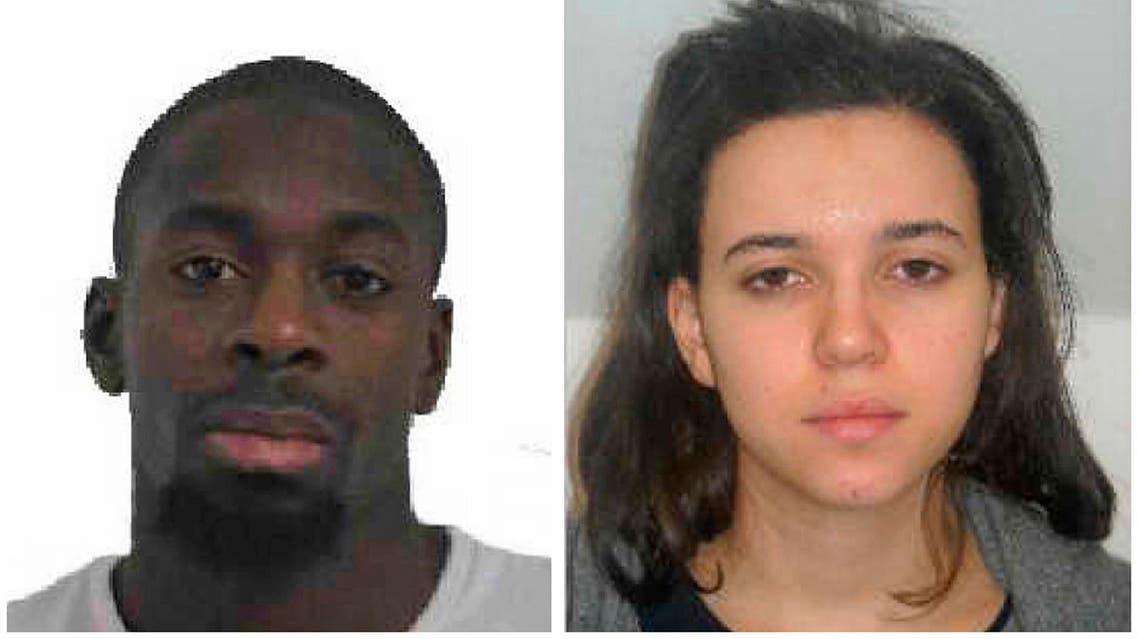 Amedy Coulibaly, left, and Hayat Boumddiene, two suspects named by police as accomplices in a kosher market attack on the eastern edges of Paris on Friday, Jan. 9, 2015. AP
