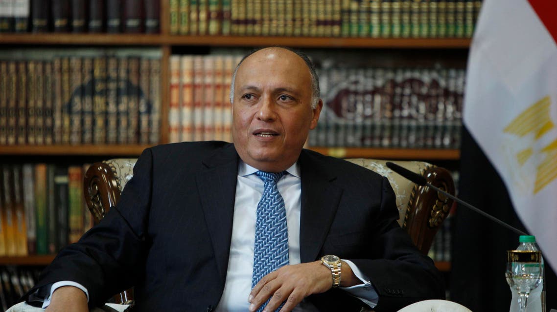 Egyptian Foreign Minister Sameh Shukri meets with Iraqi Foreign Minister Ibrahim al-Jaafari in Baghdad, Iraq, Wednesday, Dec. 17, 2014. Shukri met with Iraqi officials in Baghdad on Wednesday to discuss various issues, including regional stability. (AP Photo/Ahmed Saad, Pool)