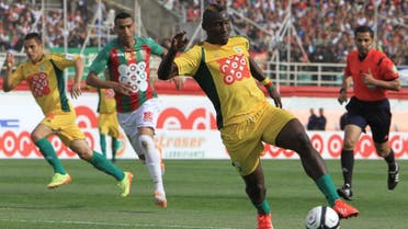 n this photo dated May 2, 2014, JS Kabylie striker Albert Ebosse of Cameroon controls the ball during the final of the Algerian soccer Cup in Blida near the Algerian capital, Algiers. AP