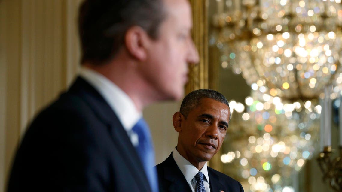 U.S. President Barack Obama (R) listens to British Prime Minister David Cameron during a joint news conference following their meeting at the White House in Washington January 16, 2015. (Reuters)