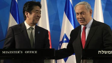  Japanese Prime Minister Shinzo Abe and Israeli Prime Minister Benjamin Netanyahu (R) give a joint press conference at the Prime Minister's office in Jerusalem. AFP