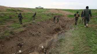 Syrian Kurds battling ISIS capture strategic Kobane hill top