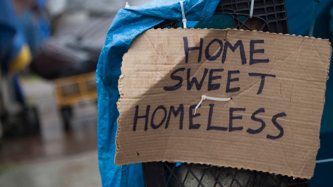 A sign on a tent is seen at Tent City 3, a homeless encampment in Seattle, Washington January 15, 2015. (File photo: Reuters) Poverty homeless