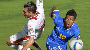 Tunisia's defender Ali Maaloul (L) challenges Cap Verde's forward Heldon during the 2015 African Cup of Nations group B football match between Tunisia and Cape Verde in Ebebiyin on Jan. 18, 2015. (AFP)