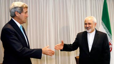 U.S. Secretary of State John Kerry shakes hands with Iranian Foreign Minister Mohammad Javad Zarif before a meeting in Geneva Jan. 14, 2015. (Reuters)