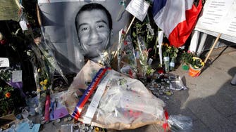 Prosecutor: France charges four men with helping Paris gunman 