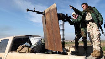 Kurdish forces cut key road in north Iraq drive