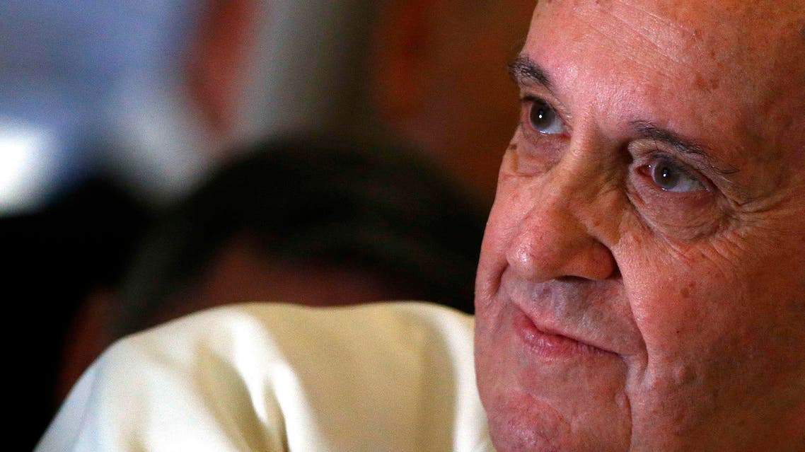 Pope Francis looks on as he speaks with journalists on his flight back from Manila to Rome, January 19, 2015. (Reuters)