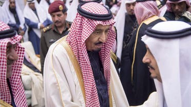 Saudi Arabia's new King Salman bin Abdul Aziz (C) being greeted by well-wishers as they pledged allegiance to him on Jan. 23, 2015 at a royal palace in Riyadh. (AFP)