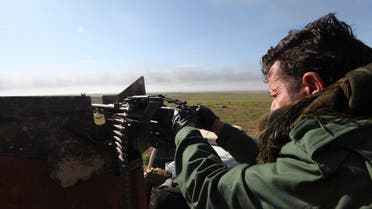 Kurdish Peshmerga fighters keep watch during the battle with Islamic State militants on the outskirts of Mosul January 21, 2015. Reuters