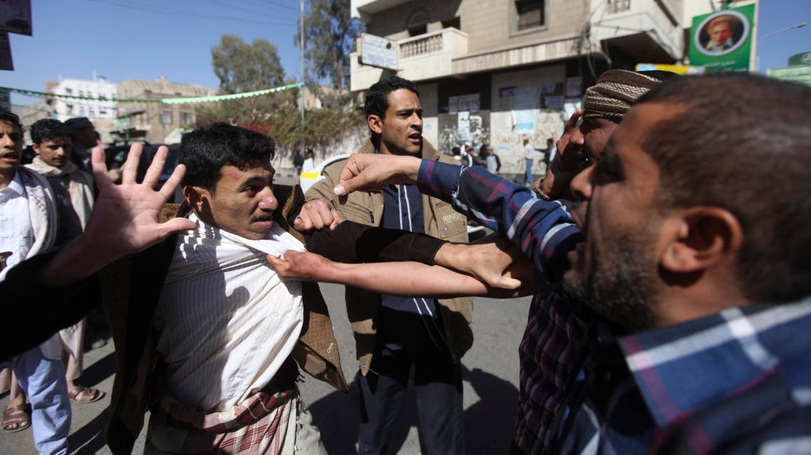 Supporters of the Houthi movement clash with anti-Houthi protesters during a rally in Sanaa January 24, 2015. (Reuters)