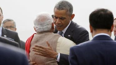  U.S. President Barack Obama hugs India's Prime Minister Narendra Modi as he arrives at Air Force Station Palam in New Delhi January 25, 2015. (Reuters) 
