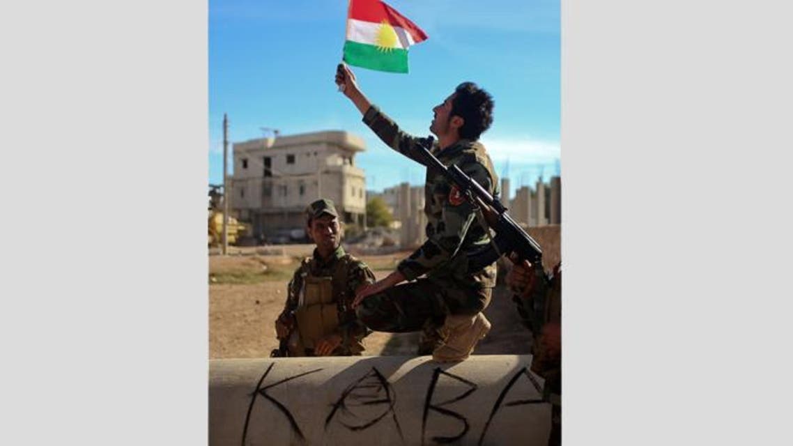 Kurdish Peshmerga fighters posing for a picture during a break in fighting against Islamic State (IS) group.