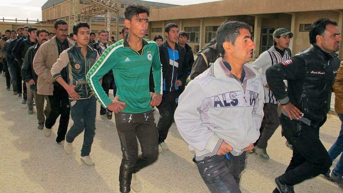 Sunni volunteers take part in military training as they prepare to fight against militants of the Islamic State, in the town of Amriyat al-Falluja in Anbar province, Jan. 8, 2015. (Reuters)