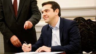 Greek leftist Tsipras sworn in as PM to fight bailout terms