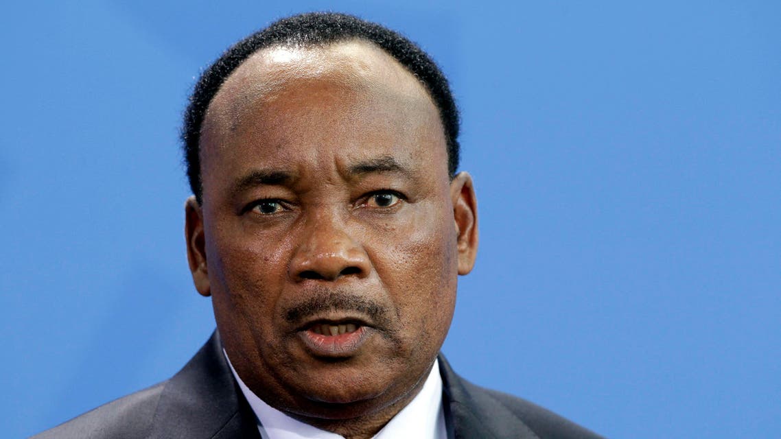 The President of Niger, Mahamadou Issoufou, addresses the media during a joint press conference with German Chancellor Angela Merkel, unseen, after a meeting at the chancellery in Berlin, Germany, Wednesday, May 8, 2013. (AP Photo/Michael Sohn)