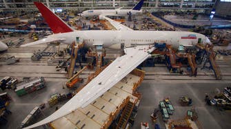 Boeing earnings rise on record commercial deliveries 