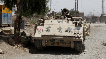 Pakistani army soldiers patrol in Miran Shah bazaar after driving out militants from Pakistan's tribal region of North Waziristan along the Afghanistan border, Wednesday, July 9, 2014. Roughly 800,000 people left North Waziristan ahead of the ground operation, raising concerns of a humanitarian catastrophe as they reached nearby areas. (AP Photo/Rebecca Santana)