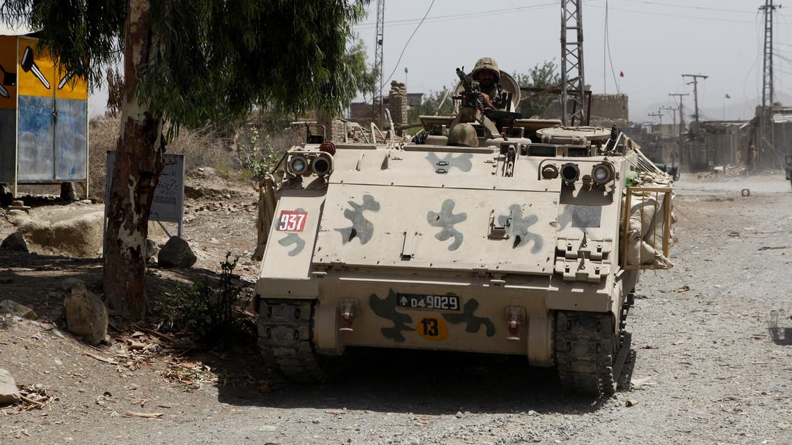 Pakistani army soldiers patrol in Miran Shah bazaar after driving out militants from Pakistan's tribal region of North Waziristan along the Afghanistan border, Wednesday, July 9, 2014. Roughly 800,000 people left North Waziristan ahead of the ground operation, raising concerns of a humanitarian catastrophe as they reached nearby areas. (AP Photo/Rebecca Santana)