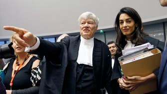 Amal Clooney dodges fashion question at court