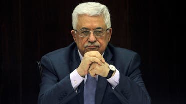 This July 28, 2013 file photo shows Palestinian President Mahmoud Abbas chair a session of the Palestinian cabinet in the West Bank city of Ramallah. AP