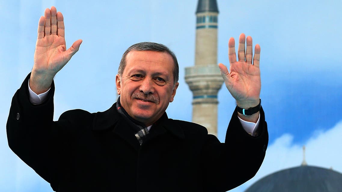 In this photo provided by the Presidential Press Service, Turkish President Recep Tayyip Erdogan salutes his supporters in Konya, Turkey, Wednesday, Dec. 17, 2014. AP