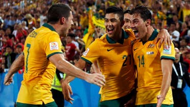 Australia's James Troisi (R) celebrates with teammates after scoring a goal against South Korea during extra time of their Asian Cup final soccer match at the Stadium Australia in Sydney January 31, 2015. (Reuters)