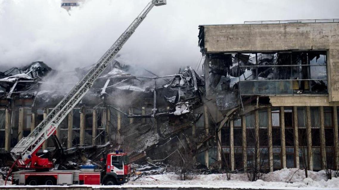 Firefighters work to extinguish a blaze at the library of the Academic Institute of Scientific Information on Social Sciences in Moscow on January 31, 2015 (AFP Photo/Alexander Utkin)