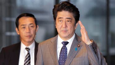 Japan's Prime Minister Shinzo Abe, right, arrives at the prime minister's official residence in Tokyo, Friday, Jan. 30, 2015. (File photo: AP)