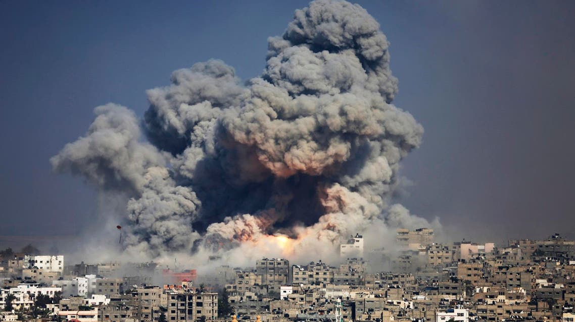 In this July 29, 2014 file photo, smoke and fire from an Israeli strike rise over Gaza City. (AP)