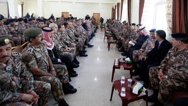 Saif al-Kasaesbeh (4th R), father of Jordanian pilot Muath al-Kasaesbeh, sits among senior officers of the Jordanian army at the headquarters of his family's clan in the city of Karak Feb. 4, 2015.  (Reuters)