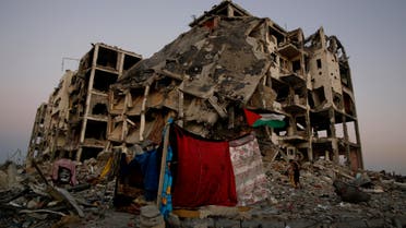 In this Aug. 7, 2014 file photo, a makeshift tent stands amid the destruction of buildings at a residential neighborhood in Beit Lahiya, northern Gaza Strip. The Israeli military said Wednesday, Sept. 10,
