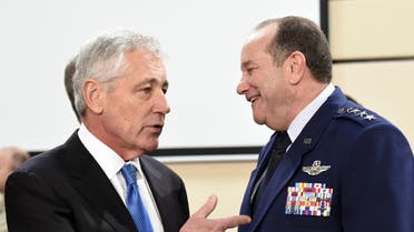 LtoR) US Defense minister Chuck Hagel talks with US General Philip Breedlove during a defence ministers meeting at the NATO headquarters in Brussels on February 5, 2015. AFP