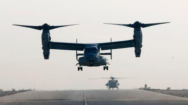 A V-22 Osprey tilt rotor aircraft lands at Asad air base after a mission in western Iraqi desert Tuesday, Oct. 14, 2008.  (AP)