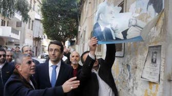 Lebanon removes political banners, a legacy of the civil war