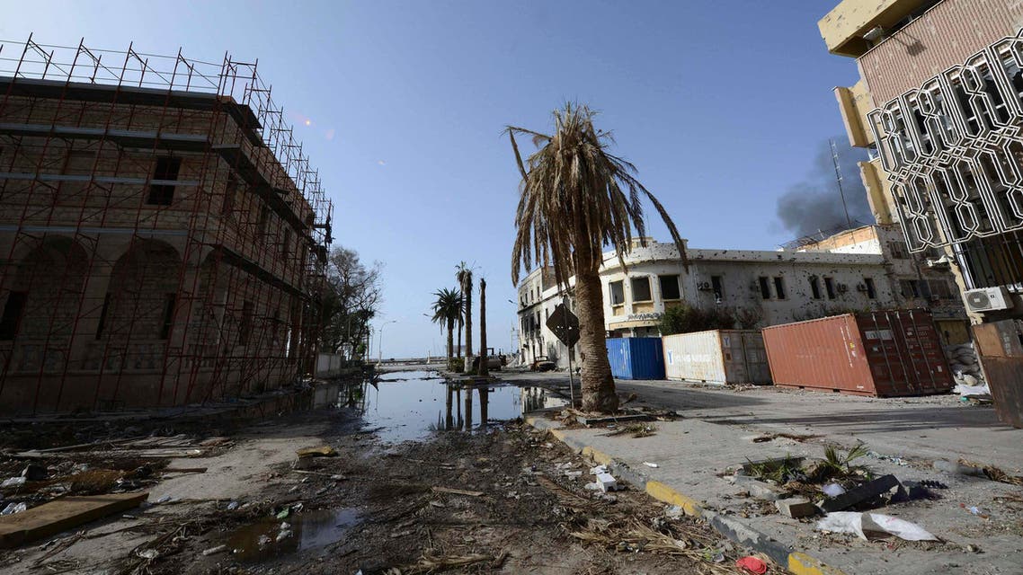 The scene on a street after clashes, between Libyan pro-government forces, backed by locals, and the Shura Council of Libyan Revolutionaries, an alliance of ex anti-Gaddafi rebels, who have joined forces with Islamist group Ansar al-Sharia, in Benghazi, January 21, 2015.