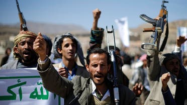 Followers of the Houthi movement shout slogans during a gathering to show support to the movement outside the Presidential Palace in Sanaa February 4, 2015. (Reuters)