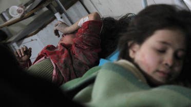 Injured girls lie in a field hospital, after what activists said was an airstrike by forces loyal to Syria's President Bashar al-Assad, in the Duma neighborhood of Damascus, February 3, 2015. (Reuters)