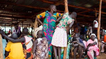 Internally displaced South Sudanese wait under a shelter for the food to be distributed in Minkaman, South Sudan , Thursday, June 26, 2014. (AP)