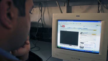 A Pakistani Internet user surfs the YouTube Web site at a local Internet cafe in Islamabad, Pakistan on Tuesday, Feb. 26, 2008. AP