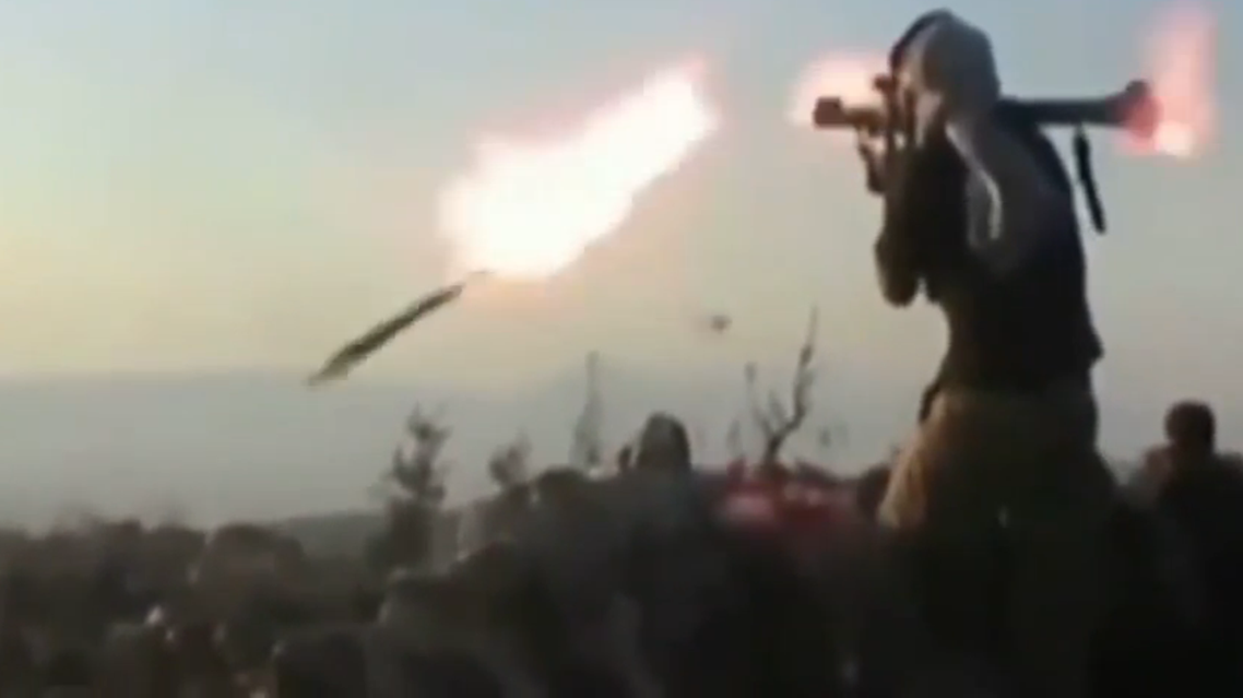 In this clip, uploaded on video-sharing site YouTube, an ISIS fighter firing an RPG discovers that the missile falls far short of the target (Still courtesy of YouTube)