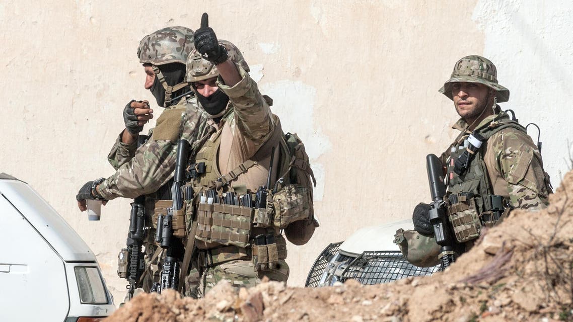 A Tunisian soldier gives a thumbs up to celebrate the end of a raid against gunmen in the Oued Ellil suburb of Tunis, Tunisia, Friday, Oct. 24, 2014. (File photo: AP)