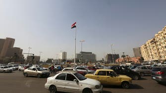 Seeking unity, Egypt flies the flag in symbolic Tahrir