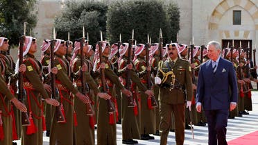 Britain's Prince Charles (R) reviews an honour guard before a meeting with Jordan's King Abdullah at the Royal Palace in Amman February 8, 2015.  (Reuters)