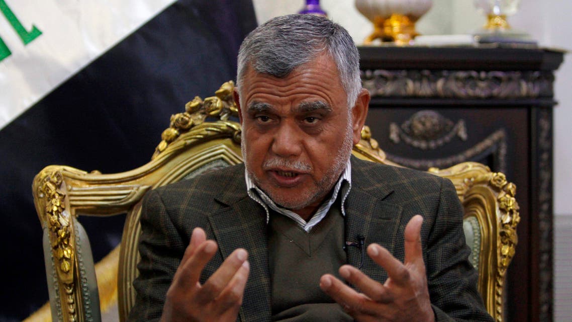 Lawmaker and paramilitary commander Hadi al-Amiri gestures during an interview with Reuters in Baghdad February 6, 2015. (Reuters)